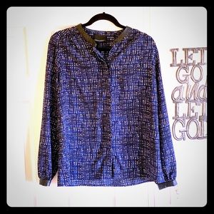 Blouse with faux leather trim